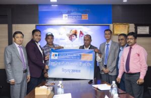 लुम्बिनी विकास बैंकको लोगो अंकित झण्डा हस्तान्तरण